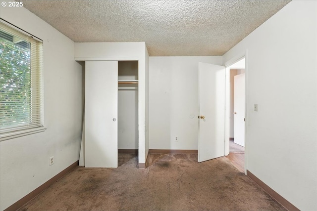 18495 SW Springfield St, Beaverton, OR 97078 - unfurnished bedroom featuring carpet floors, a textured ceiling, baseboards, and a closet