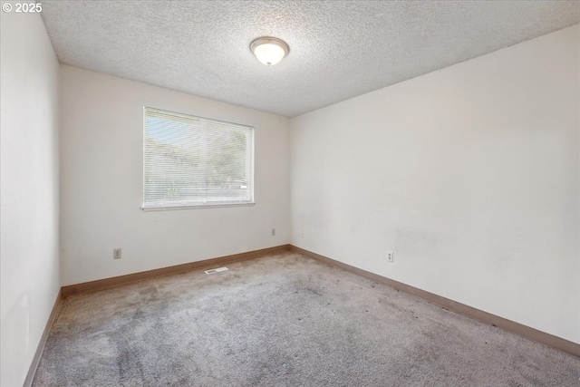 18495 SW Springfield St, Beaverton, OR 97078 - spare room with carpet, a textured ceiling, and baseboards