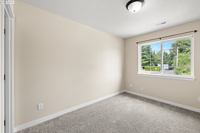 834 NW 3rd Ave, Canby, OR 97013 - carpeted empty room with a textured ceiling and baseboards