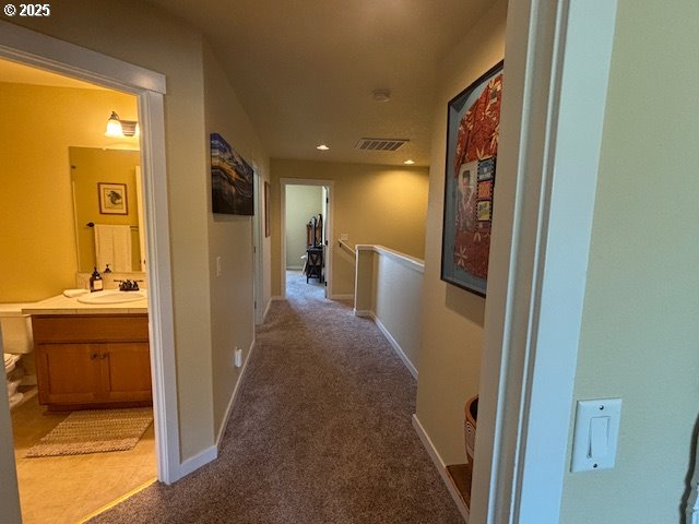 834 NW 3rd Ave, Canby, OR 97013 - hall with carpet flooring, baseboards, and recessed lighting
