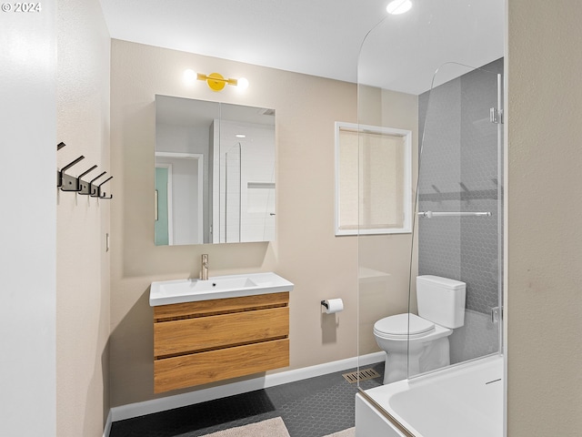 bathroom with a shower, vanity, and toilet