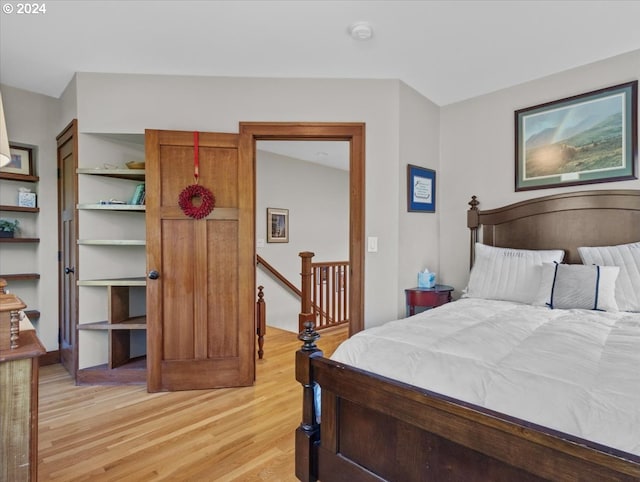 bedroom with light hardwood / wood-style flooring