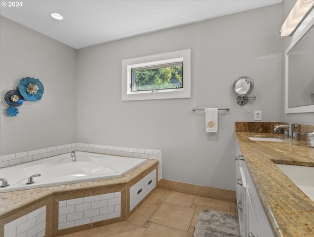 bathroom featuring a tub and vanity