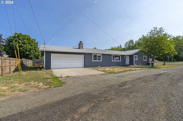 ranch-style house with a garage