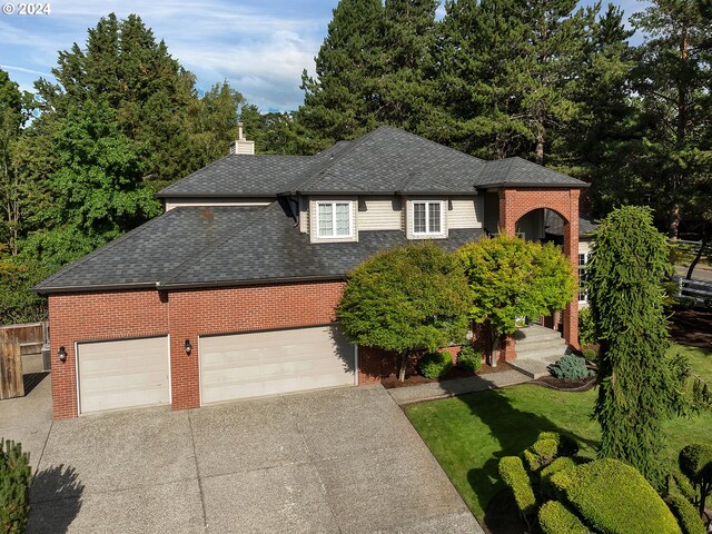 view of front of home with a garage