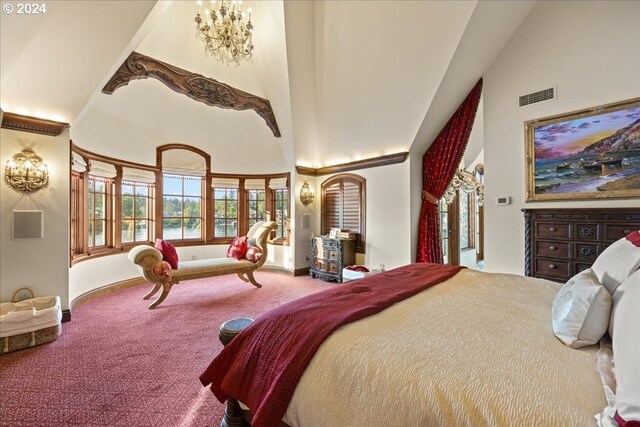 carpeted bedroom featuring a towering ceiling and a notable chandelier