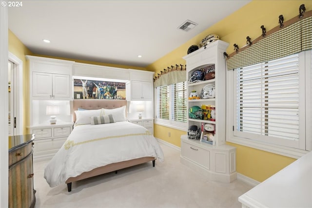 bedroom featuring light carpet, recessed lighting, visible vents, and baseboards