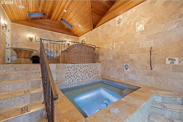 bathroom featuring lofted ceiling and wooden ceiling