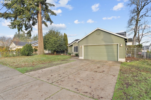 view of front of home featuring a front lawn and a garage