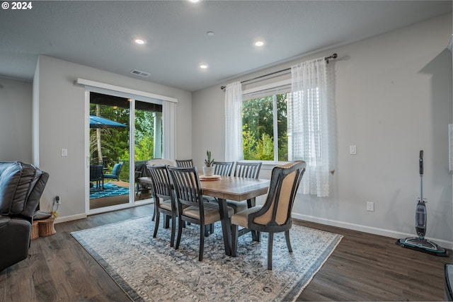 dining room featuring dark hardwood / wood-style flooring