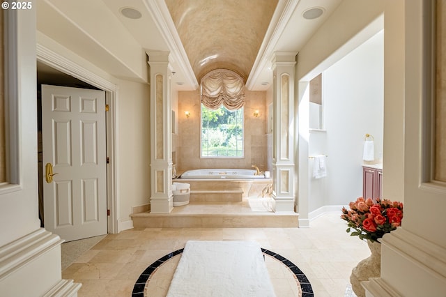 20417 SW Inglis Dr, Beaverton, OR 97007 - bathroom with inlaid floor details, decorative columns, baseboards, a bath, and vanity