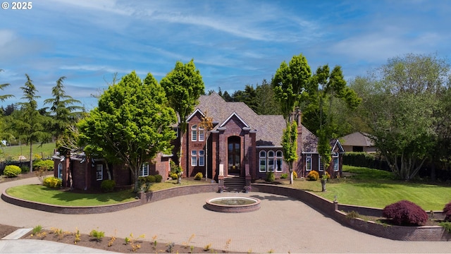 20417 SW Inglis Dr, Beaverton, OR 97007 - traditional-style home featuring a front yard and brick siding