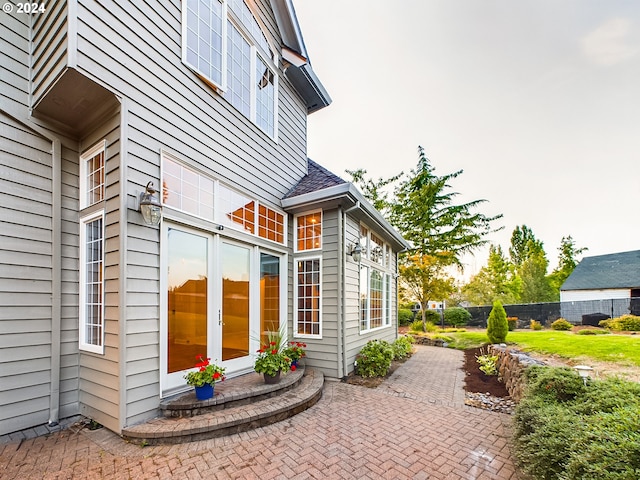 view of home's exterior with french doors and a patio area