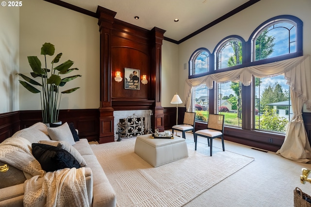 20417 SW Inglis Dr, Beaverton, OR 97007 - sitting room with crown molding, carpet floors, a wainscoted wall, a towering ceiling, and recessed lighting