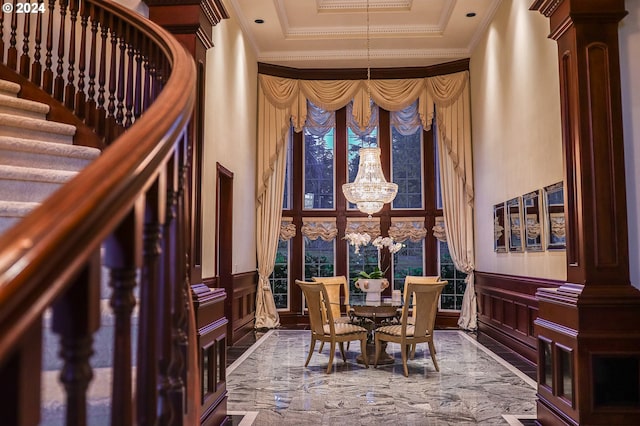 20417 SW Inglis Dr, Beaverton, OR 97007 - dining area featuring a chandelier, a decorative wall, decorative columns, ornamental molding, and a raised ceiling