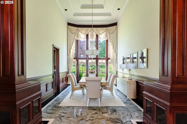 20417 SW Inglis Dr, Beaverton, OR 97007 - dining room featuring ornamental molding, a chandelier, and a wainscoted wall