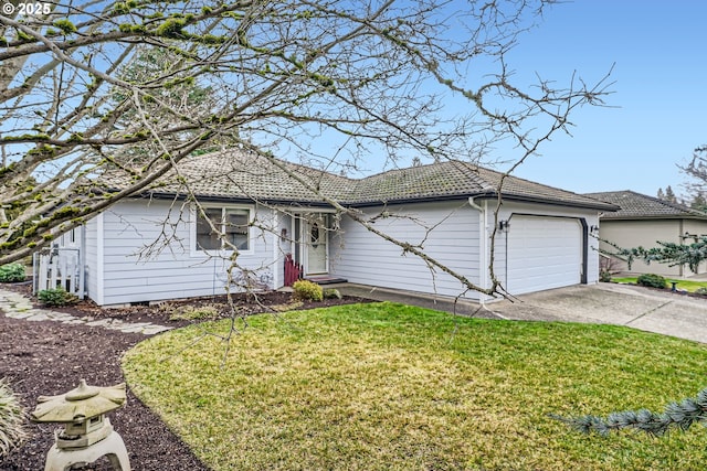 ranch-style home featuring a garage and a front yard