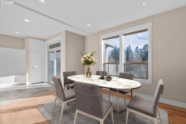 dining room with light wood-type flooring