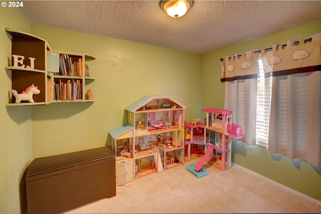 486 Ridge Dr, Gearhart, OR 97138 - recreation room featuring carpet floors and a textured ceiling