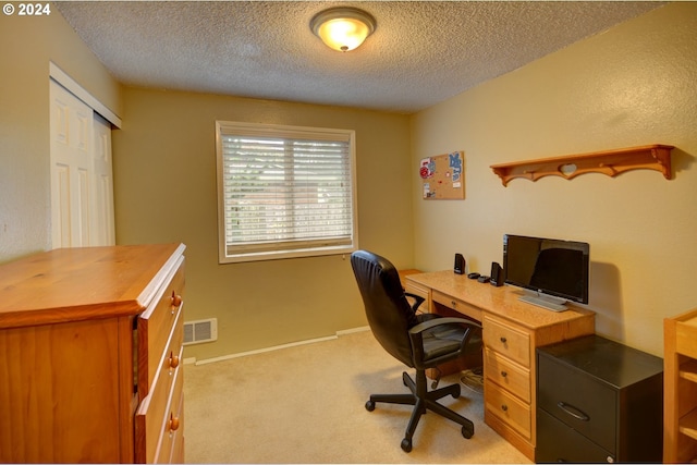 486 Ridge Dr, Gearhart, OR 97138 - office space featuring light colored carpet, visible vents, baseboards, and a textured ceiling