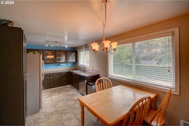486 Ridge Dr, Gearhart, OR 97138 - dining area featuring visible vents and an inviting chandelier