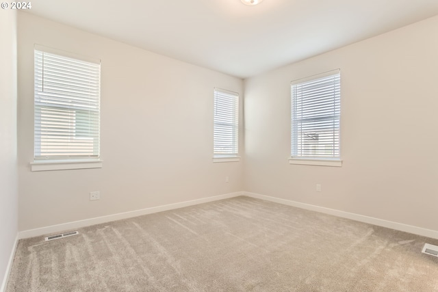 empty room with light carpet