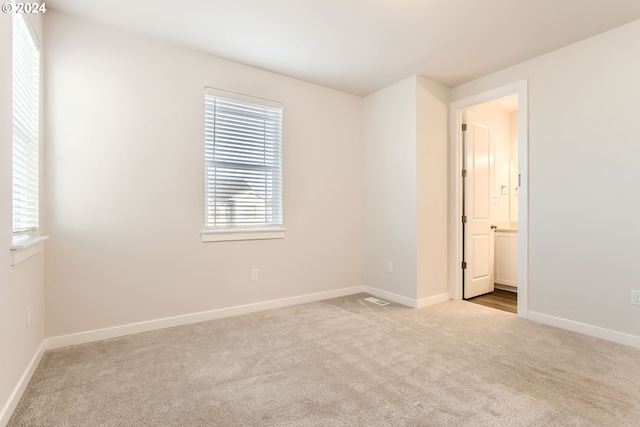 view of carpeted spare room