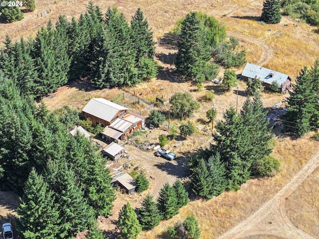 birds eye view of property featuring a rural view