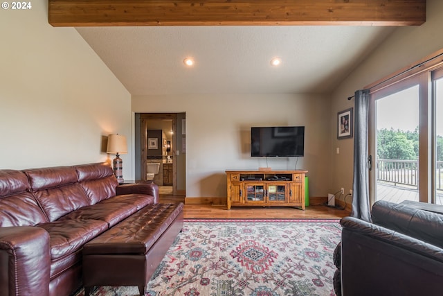 living room featuring vaulted ceiling with beams, baseboards, wood finished floors, and recessed lighting