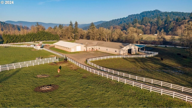 aerial view featuring a rural view and a mountain view