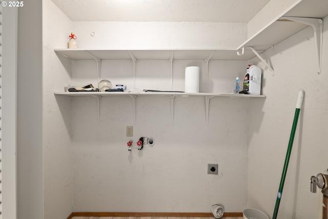 laundry room with washer hookup and electric dryer hookup