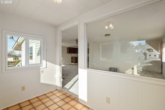 bathroom with tile patterned flooring and ceiling fan