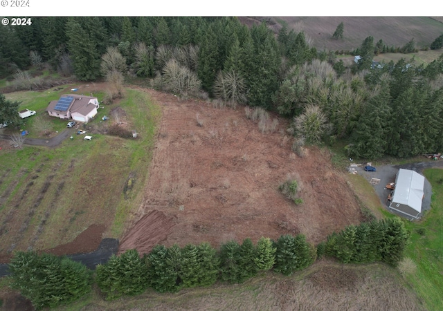 birds eye view of property featuring a rural view