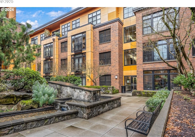 view of community featuring a patio