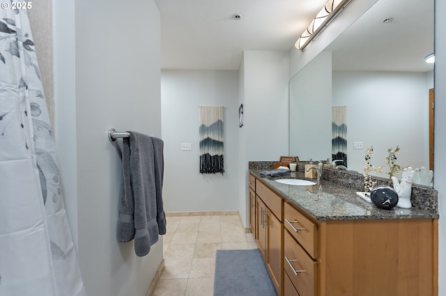 bathroom featuring vanity and tile patterned flooring