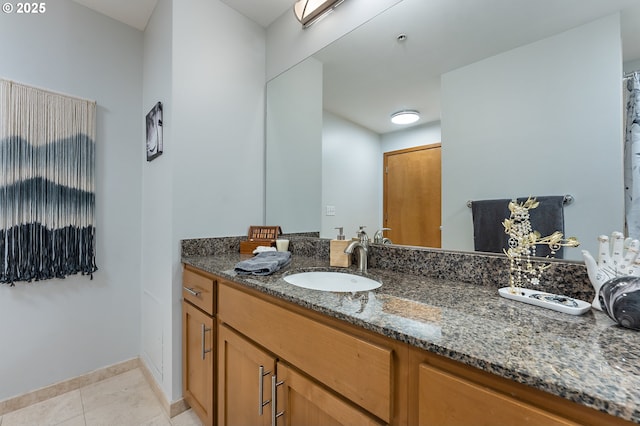 bathroom featuring tile patterned floors and vanity