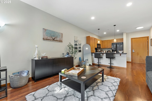 living room with wood-type flooring