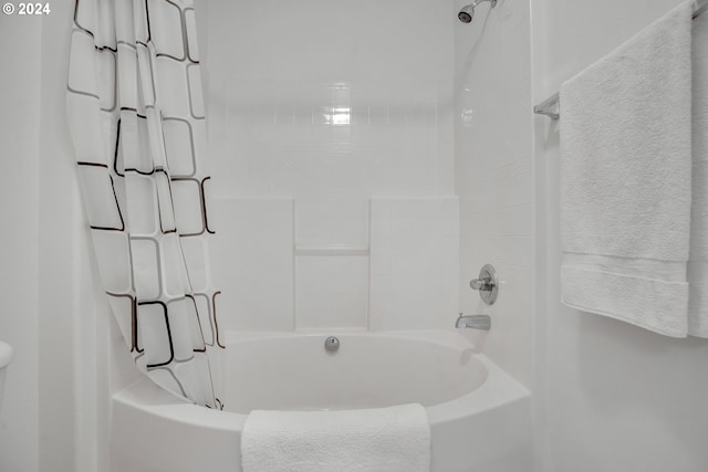 full bath featuring shower / bathtub combination with curtain