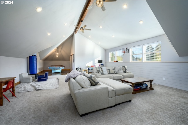 living room featuring carpet, lofted ceiling with beams, wooden walls, and ceiling fan