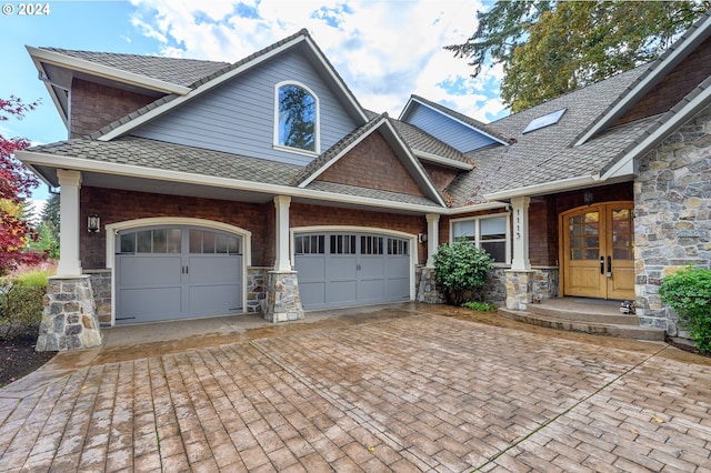 craftsman-style home featuring a garage