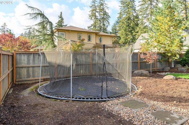 view of yard featuring a trampoline