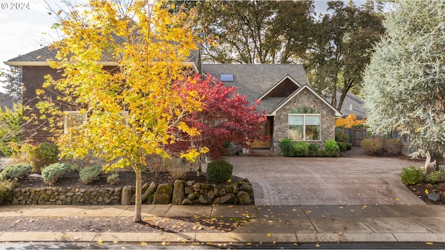 view of property hidden behind natural elements