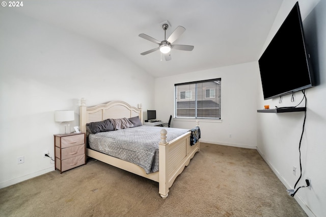 bedroom with vaulted ceiling, carpet, and ceiling fan