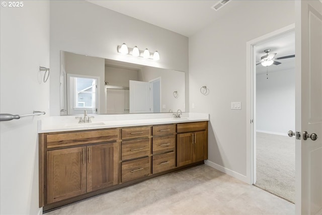 bathroom featuring vanity and ceiling fan