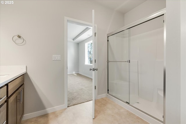 bathroom with vanity and walk in shower