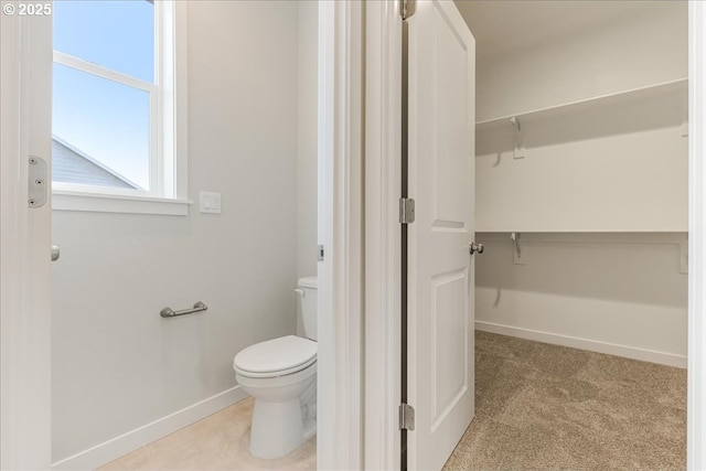 bathroom featuring toilet