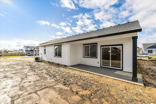 back of house featuring central AC unit and a patio area