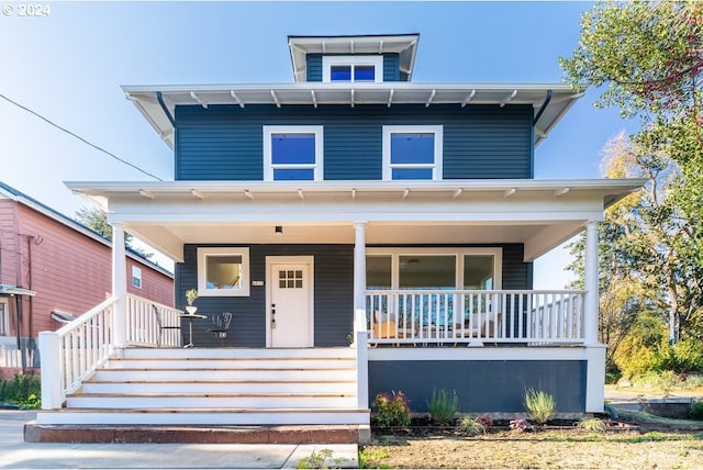 italianate home with covered porch