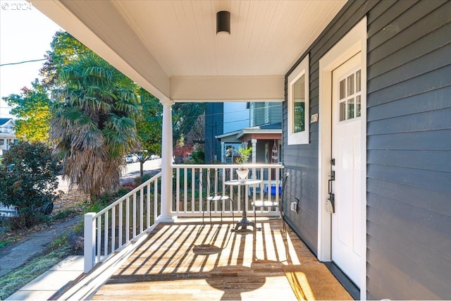 wooden deck featuring a porch