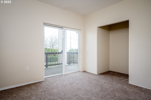 empty room featuring carpet